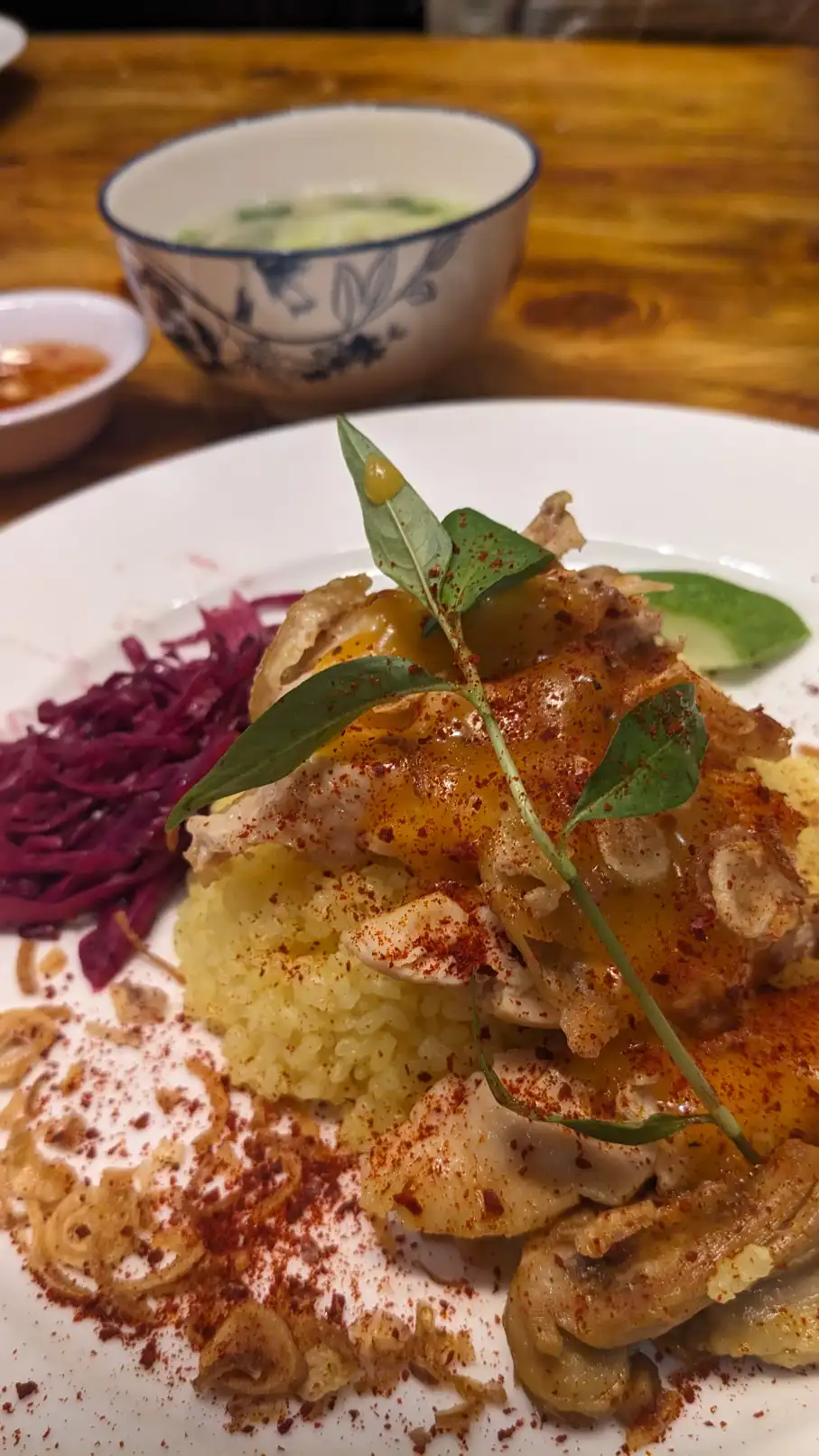 Chicken Rice with ginger fish sauce and egg yolk sauce, purple lettuce | Quan_Nguyen
