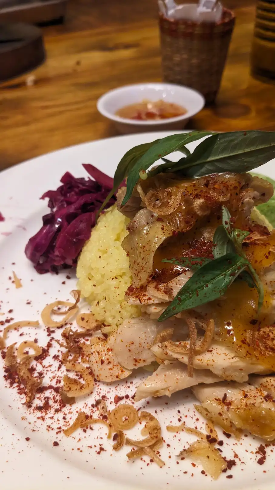 Chicken Rice with ginger fish sauce and egg yolk sauce, purple lettuce | Quan_Nguyen